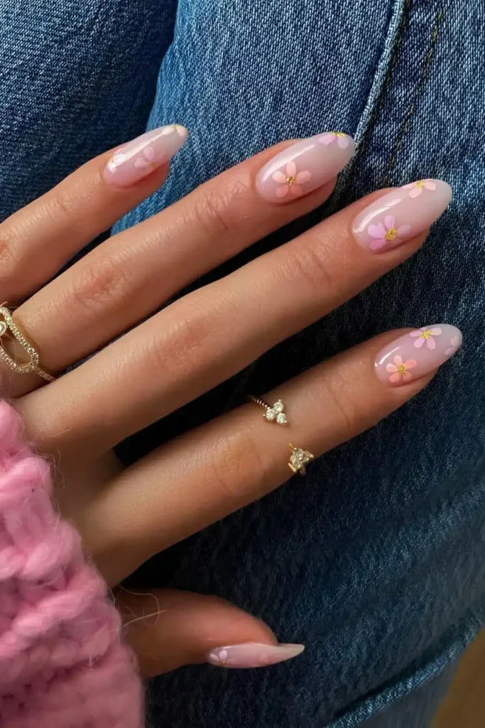 Milky Nails With Pink and Orange Flowers for a Fresh Floral Look