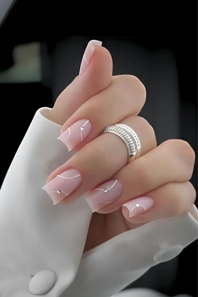 Milky Pink Mani With Swirls and Gems