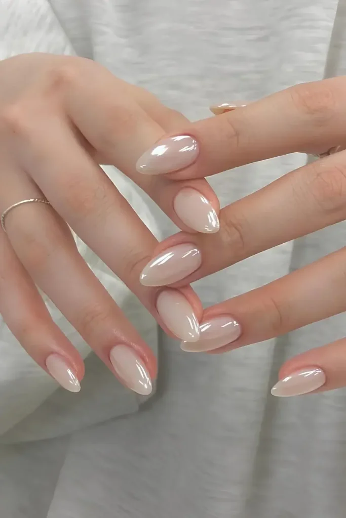 Swirly White French Nails With Hearts for a Romantic Modern Look