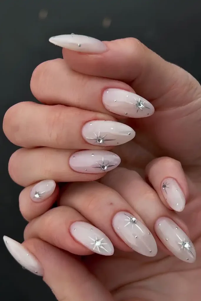Milky White Celestial Mani With Rhinestones That Sparkles Beautifully