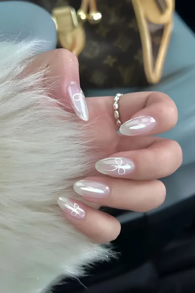 Milky White Chrome Nails With Coquette Bows You'll Love