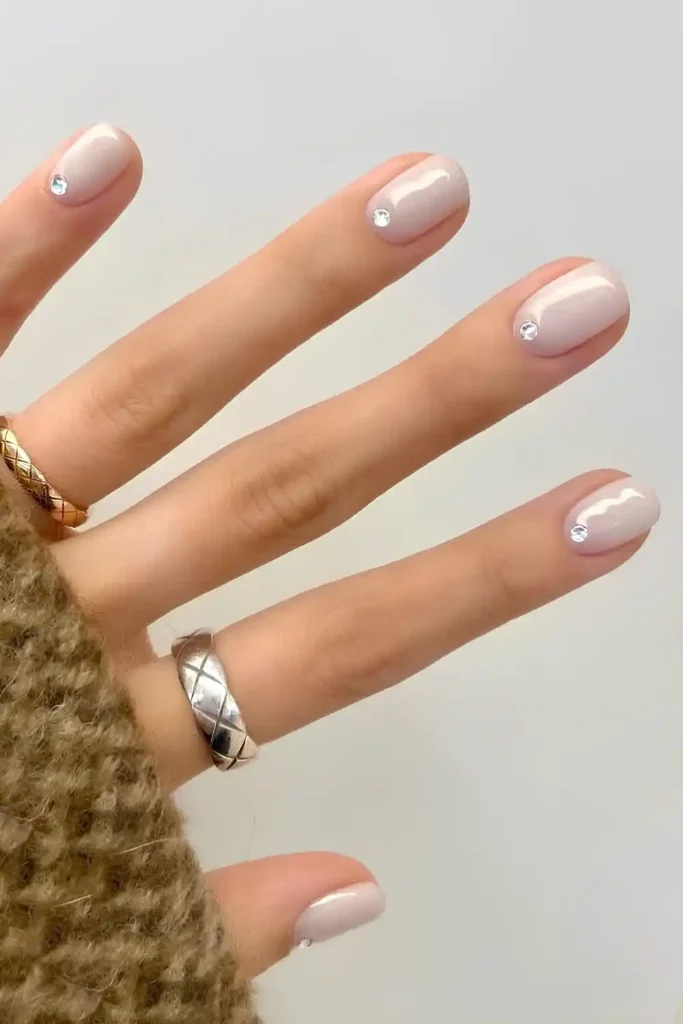 Milky White Mani With Cuticle Rhinestones for a Luxe Finish