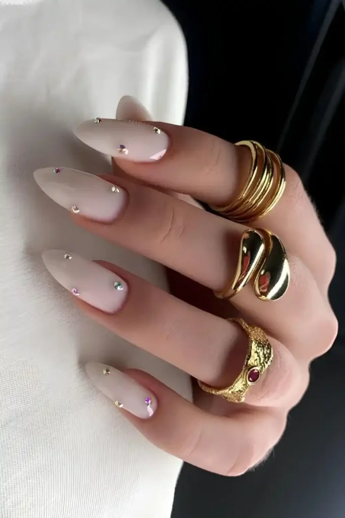 Milky White Mani With Gem Accents That Sparkle Beautifully