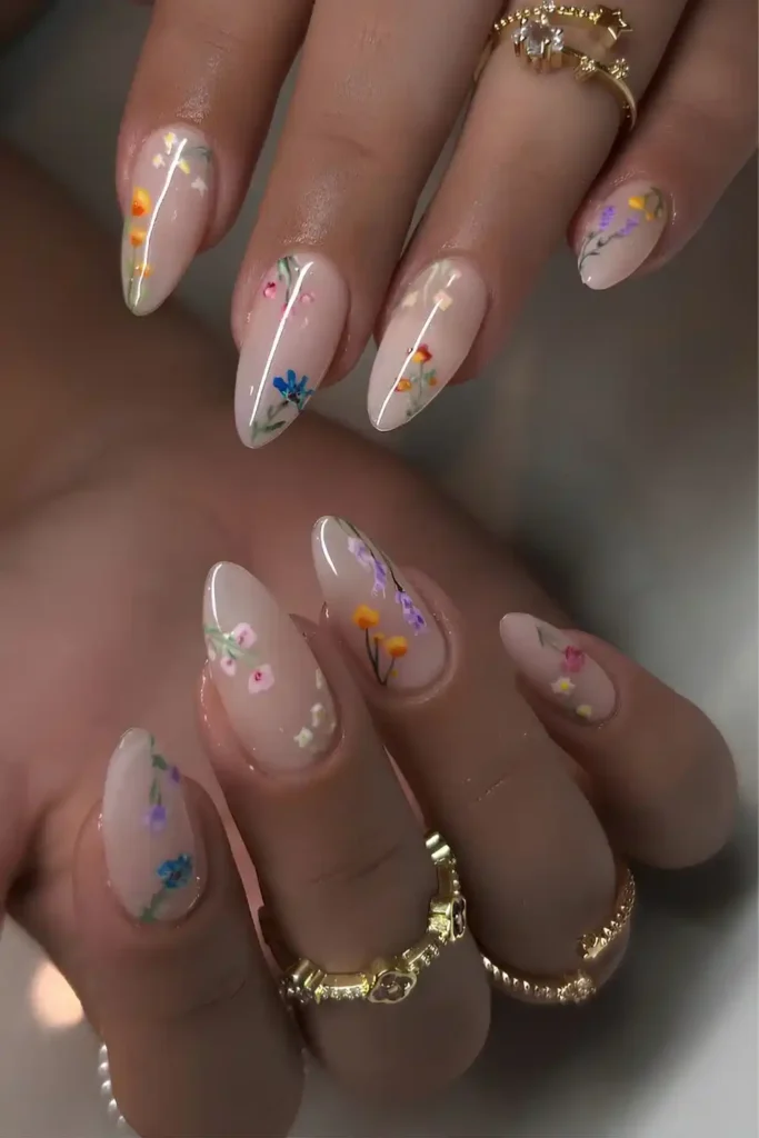 Milky White Nails With Colorful Floral Details That Brighten Every Look