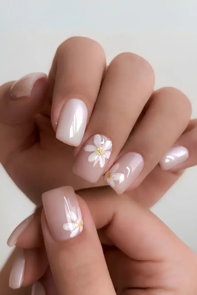 Milky White Nails With Daisy Flower Art That Feels Fresh and Delicate