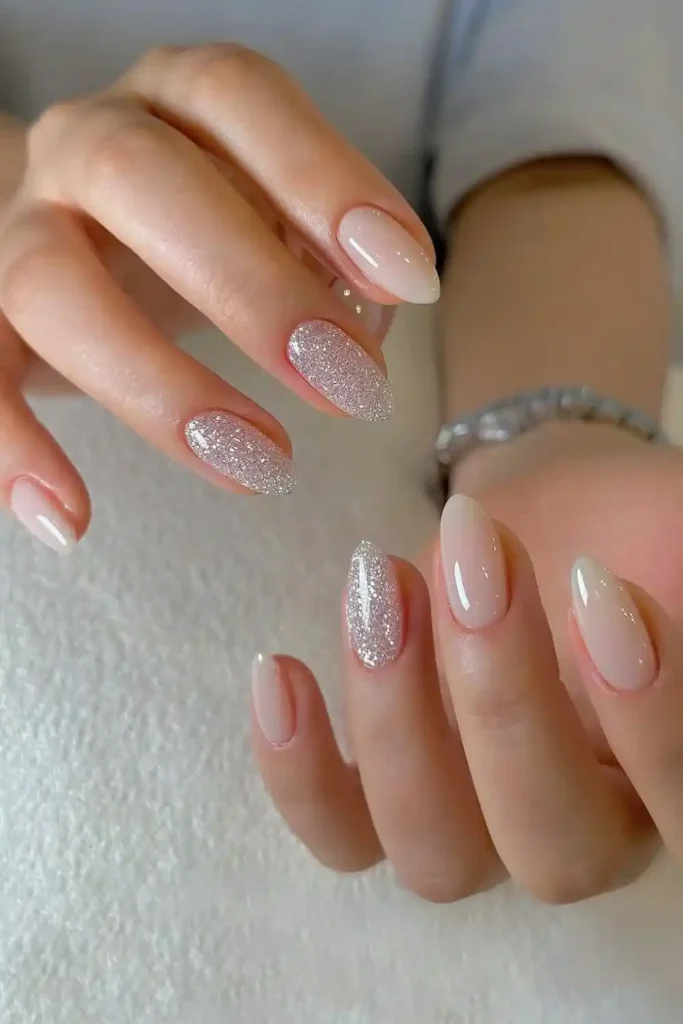 Milky White Nails With Glitter Accents That Add Instant Glam
