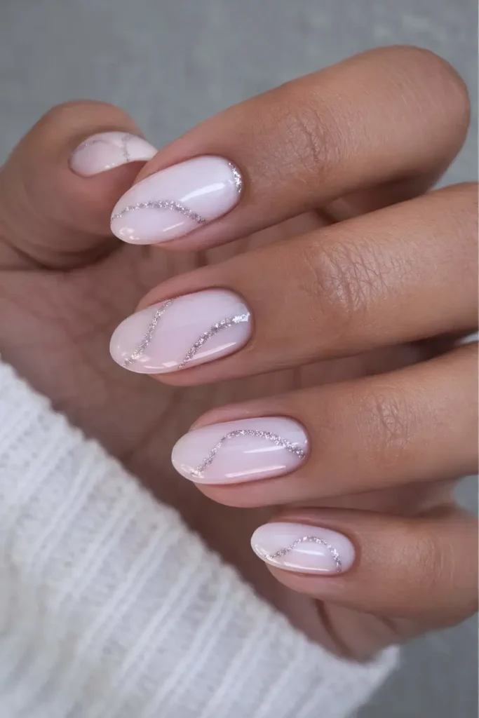 Milky White Nails With Silver Glitter Swirl Art