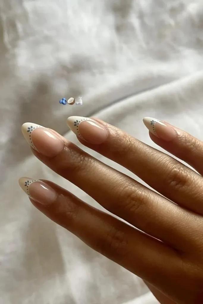 Minimal White French Tip Nails With Tiny Floral Details