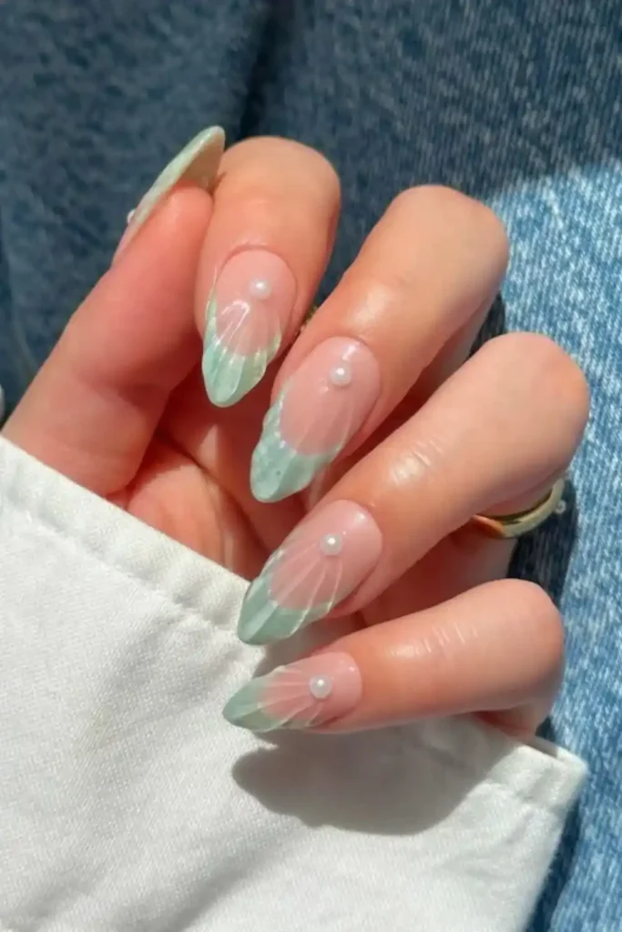Mint Green Seashell French Nails Stacked With Pearls for a Beach Inspired Look