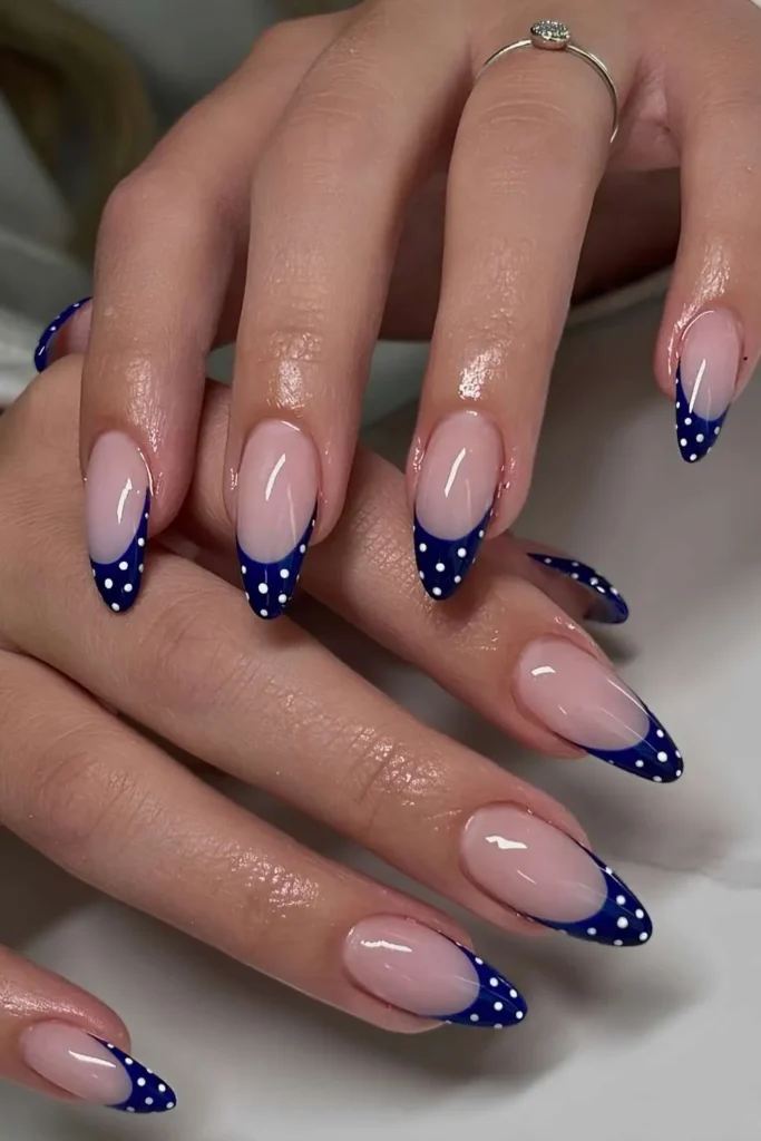 Navy Blue Polka Dot French Manicure for a Playful Chic Style