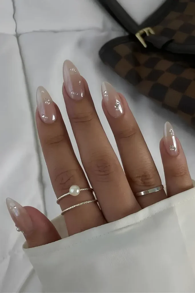 Neutral Chrome Nails With Pearl Accents for an Elegant Finish