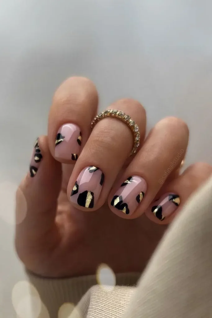 Nude Nails With Black and Gold Leopard Spots