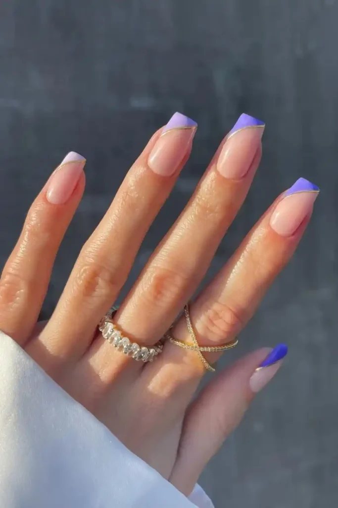 Nude Nails With Side Tips in Different Shades of Purple for a Unique Look