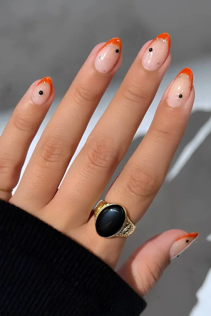 Orange French Nails With Celestial Art for a Magical Touch