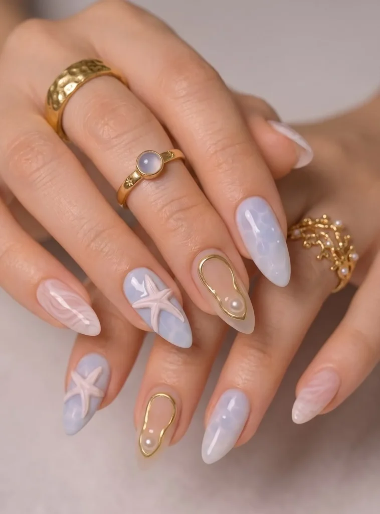Pastel Blue Starfish Nails With Pearl and Gold Accents
