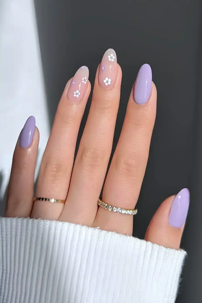 Pastel Purple Nails With Floral Accents That Look Sweet and Feminine