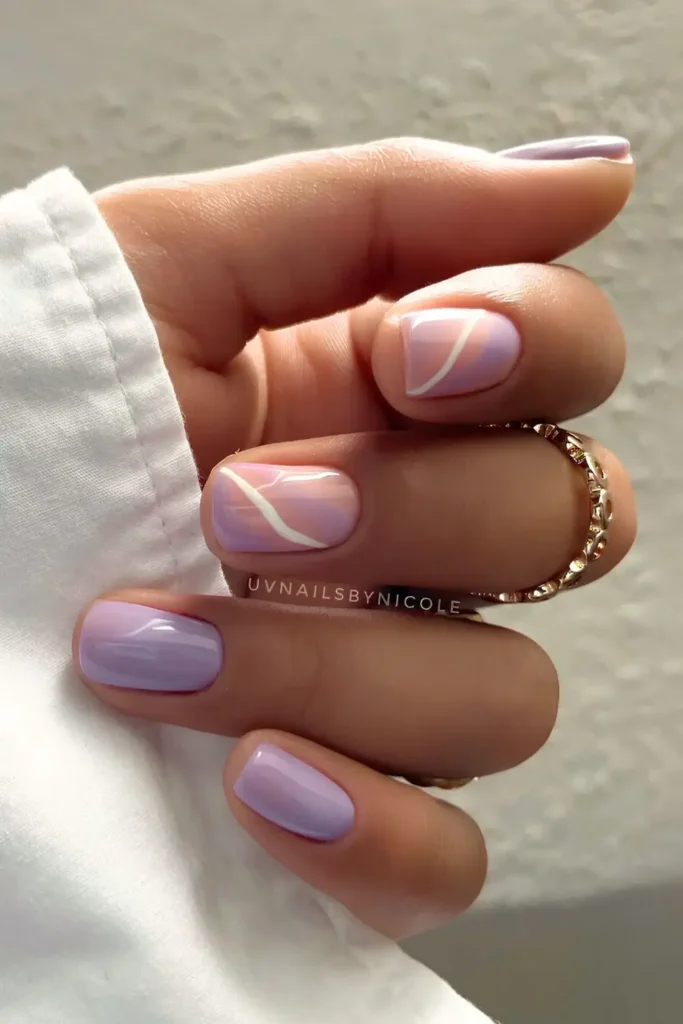 Pastel Purple Nails With Swirls