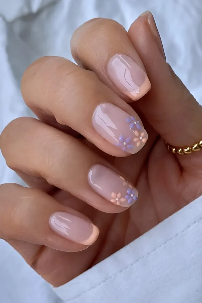 Peach French Mani With Lavender Florals for a Soft Romantic Style