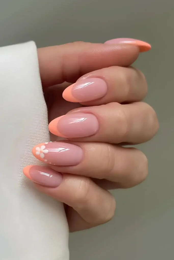 Peach French Nails With Daisies for a Fresh Manicure