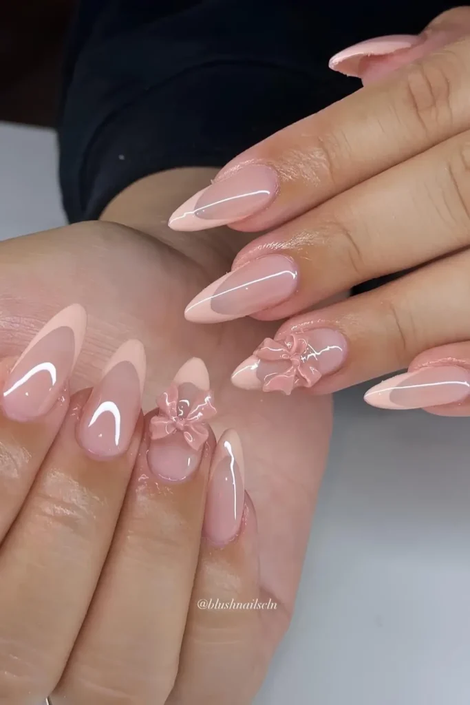 Peach French Nails With Textured Bows for a Cute Feminine Touch