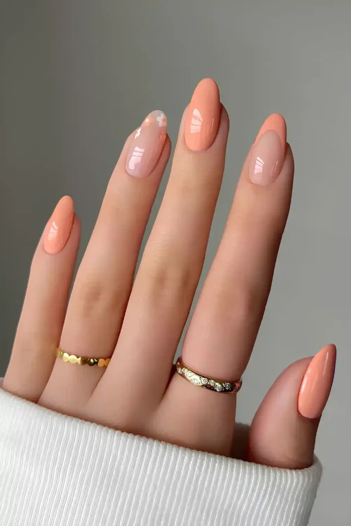 Peach Manicure With Floral Accents for a Soft Elegant Style