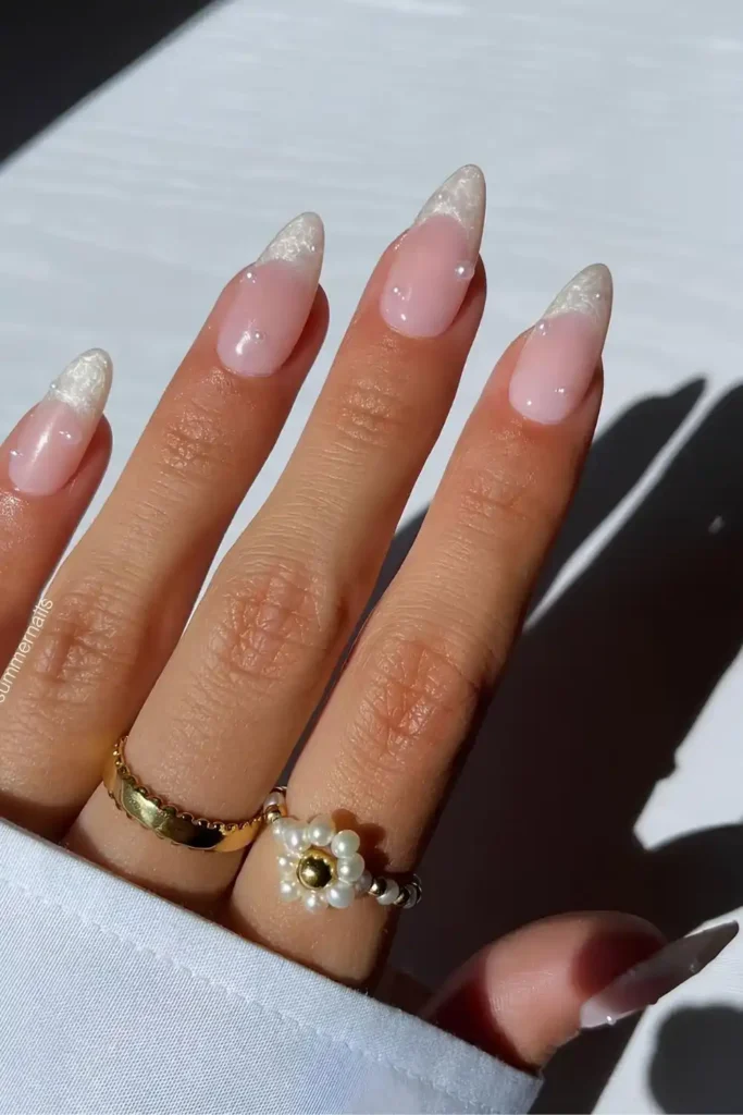 Pearly White French Nails With Stacked Pearls for a Luxe Elegant Look