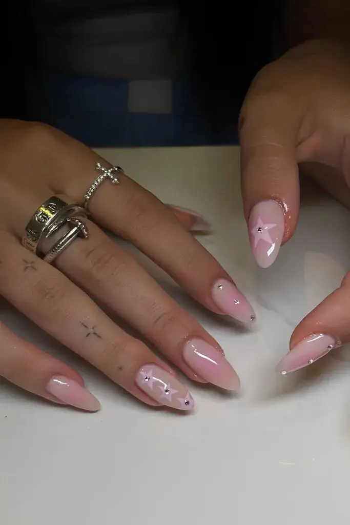 Pink Aura Nails With Star Accents That Sparkle Beautifully