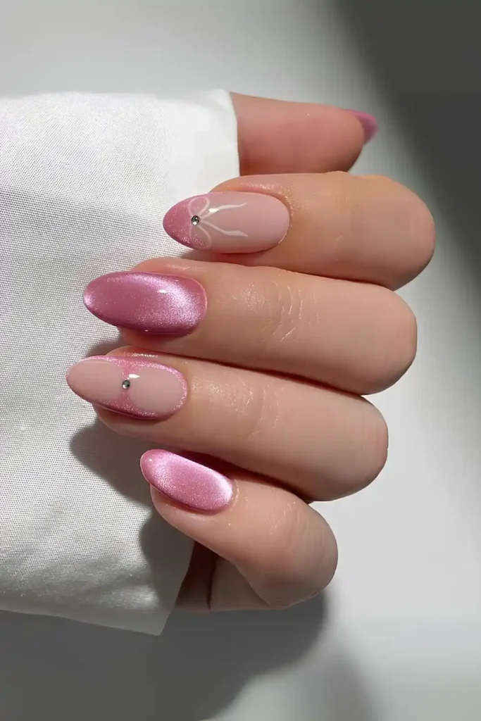 Pink Cat Eye Nails With Bow Accent That Look Sweet and Glamorous