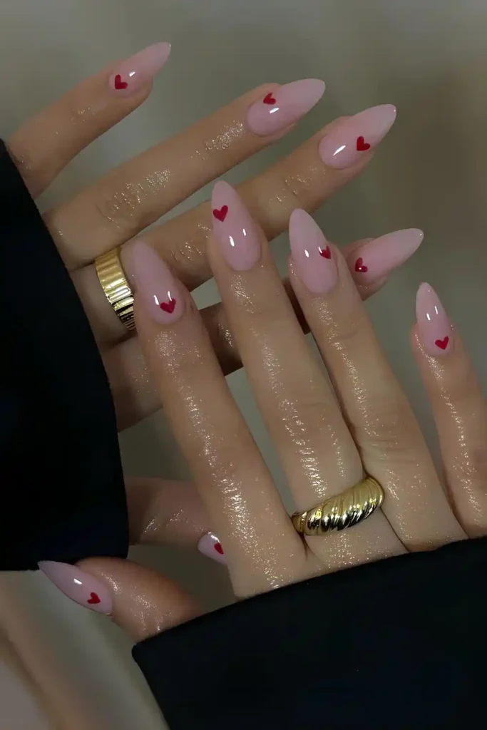 Pink Manicure With Red Hearts for a Sweet Romantic Style