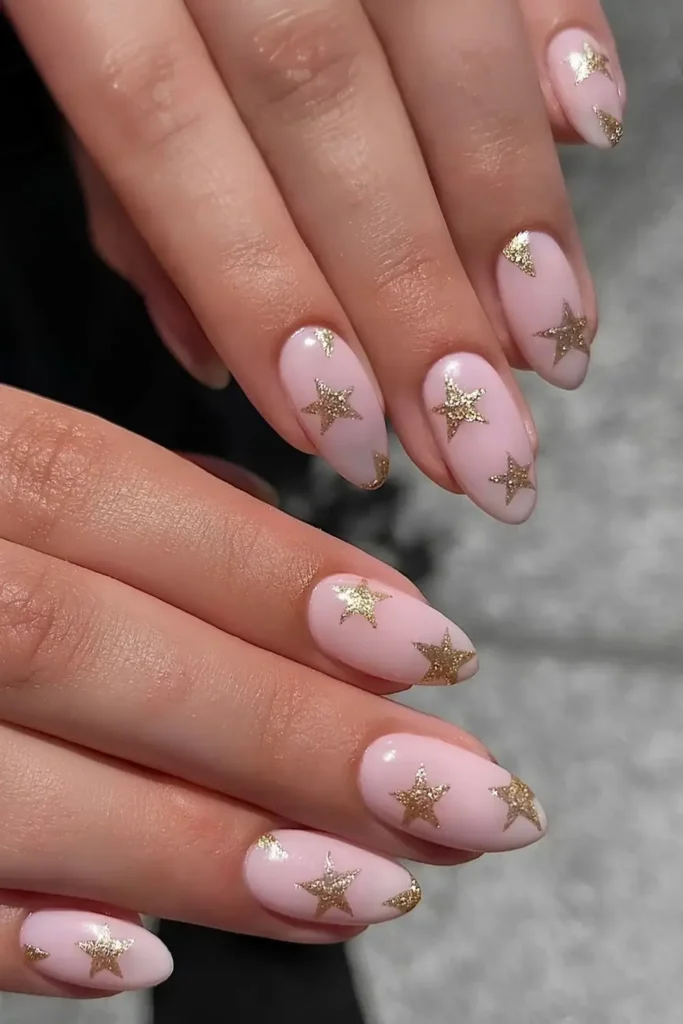 Pink Nails With Gold Star Art for a Celestial Inspired Look