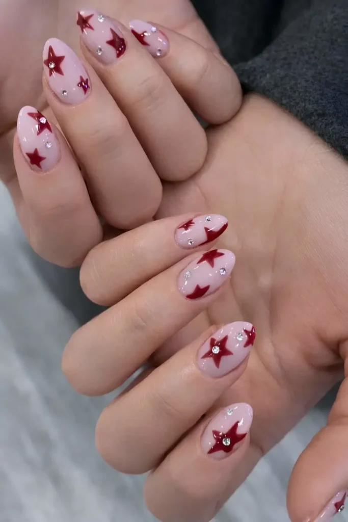 Pink Nails With Red Stars and Rhinestones