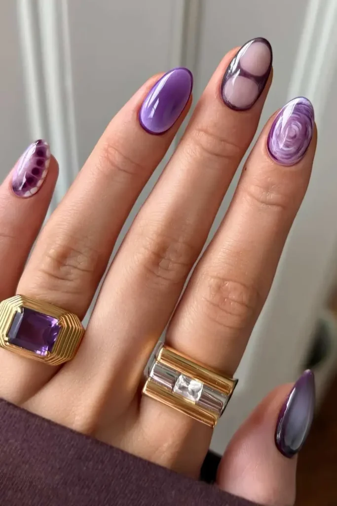 Purple Mismatched Nail Design for a Trendy Look