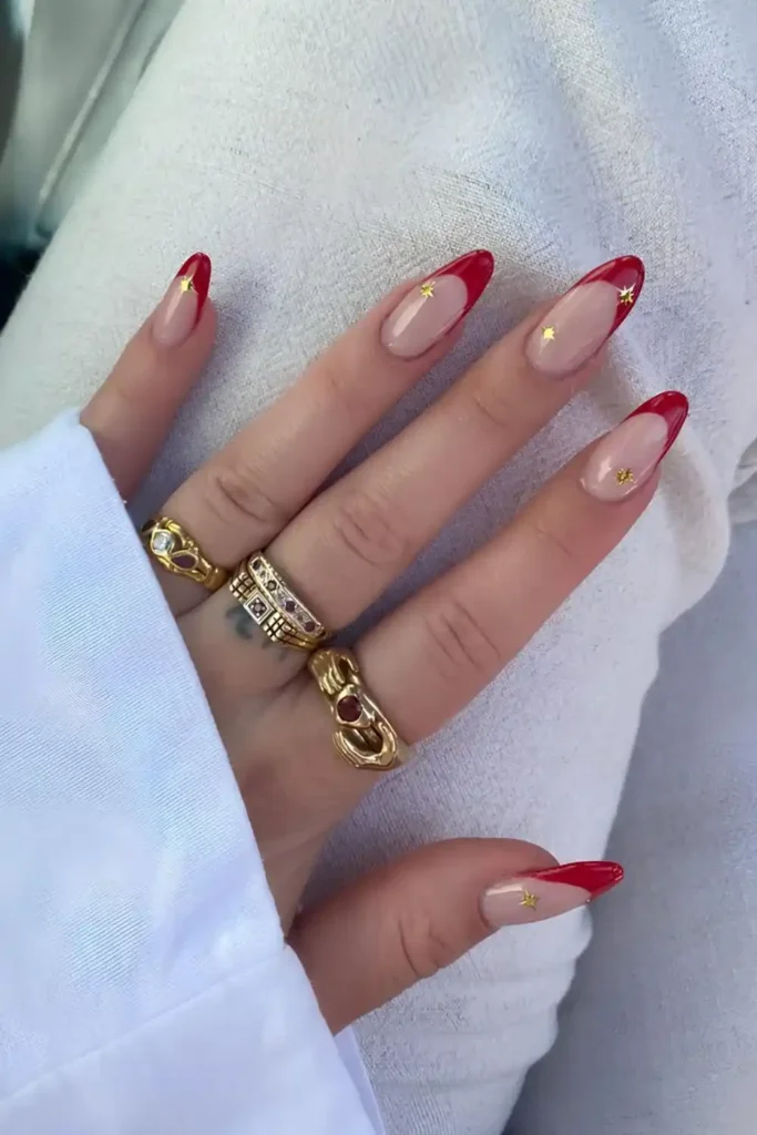 Red French Manicure With Chrome Stars That Looks Glamorous