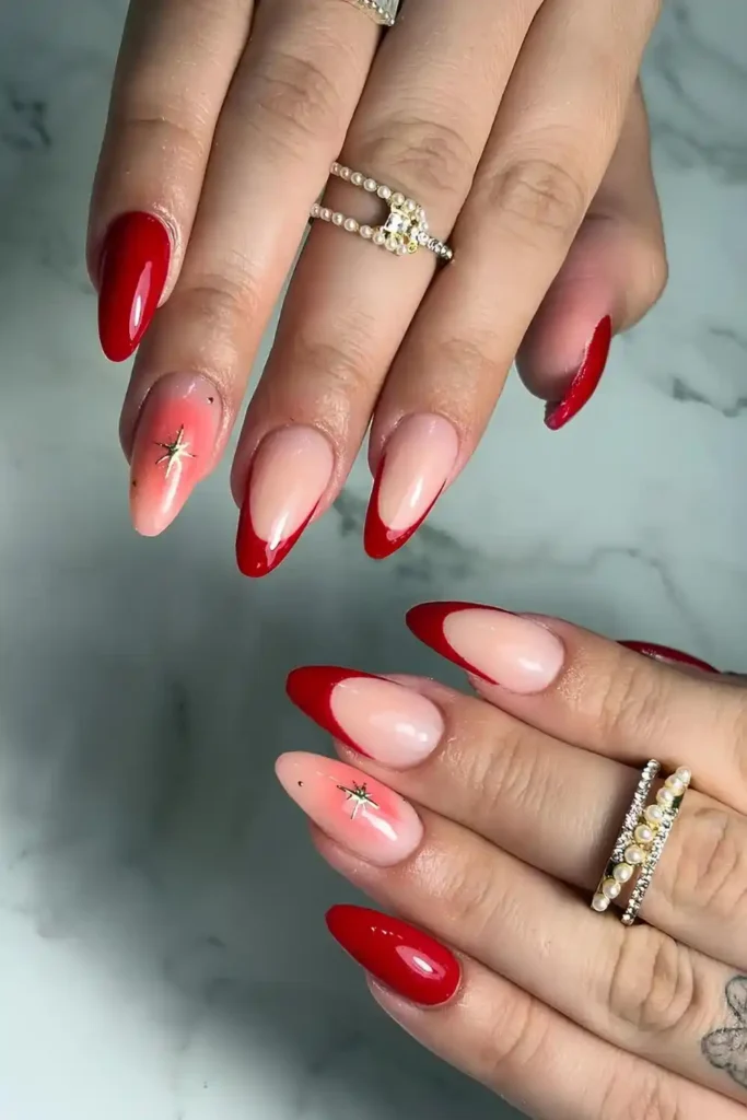 Red French Nails With Aura Accent Nail for a Trendy Glowing Finish