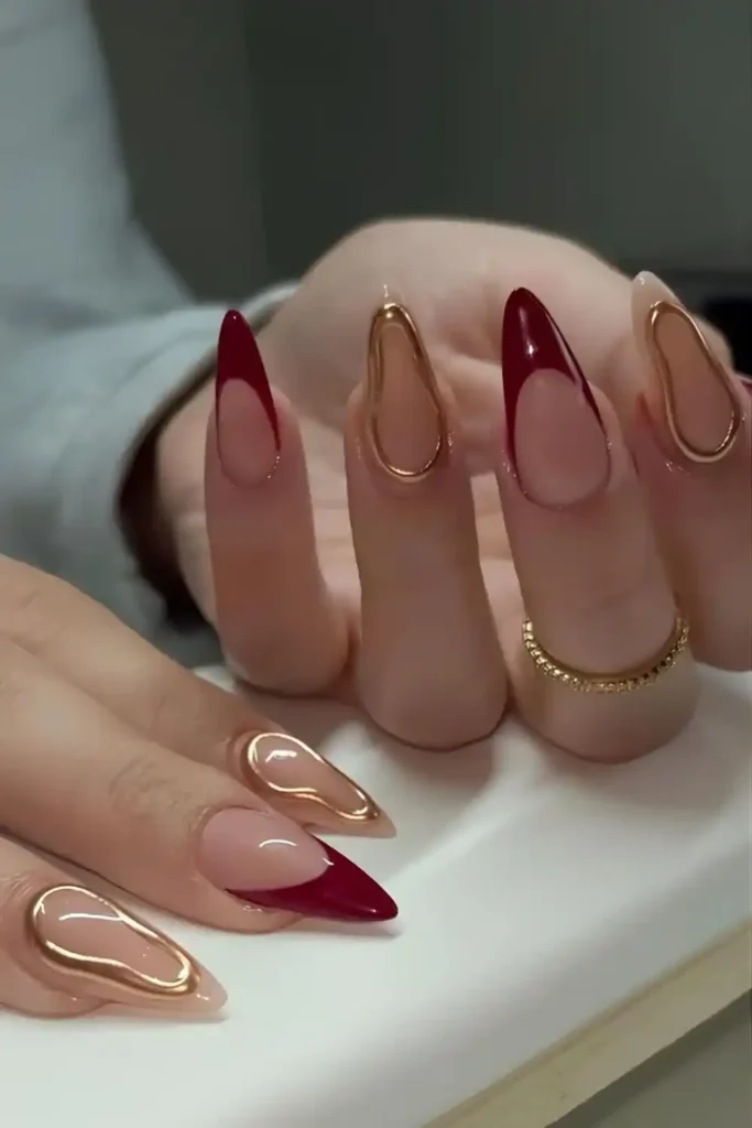 Red French Nails With Gold Chrome Accents for a Luxe Finish
