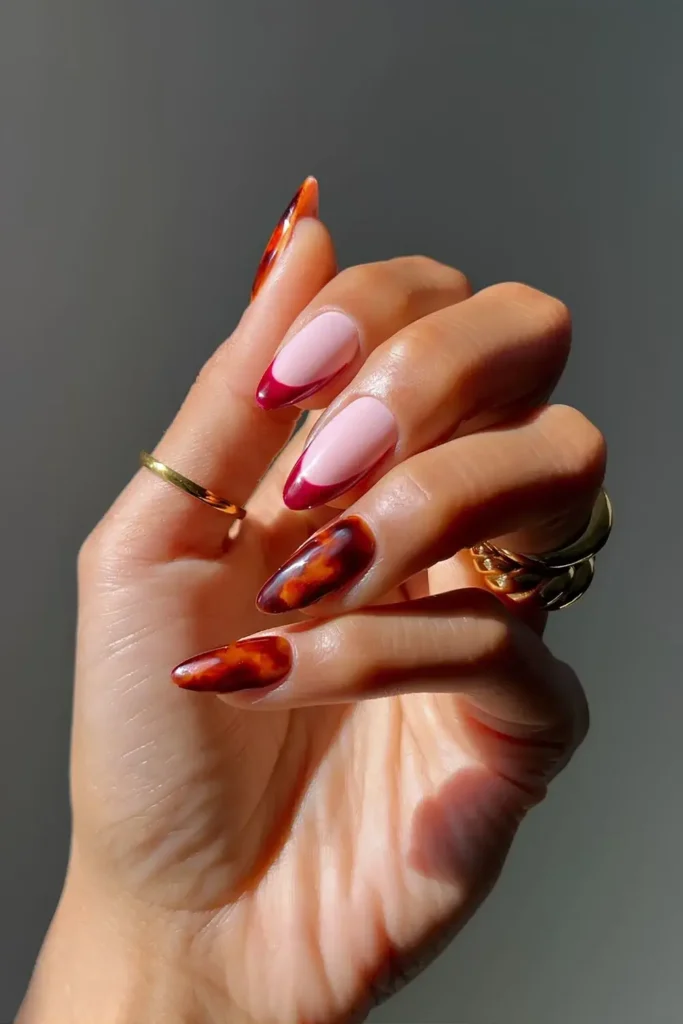 Red French Nails With Tortoise Shell Accent for a Stylish Fall Look