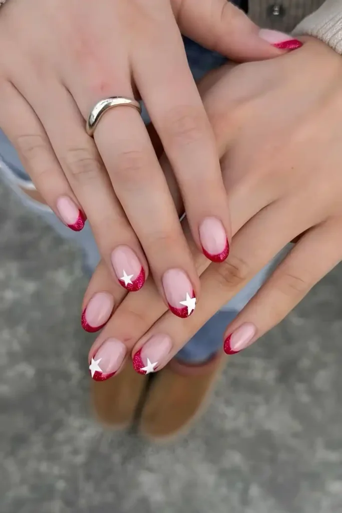 Red French Nails With White Stars for a Celestial Inspired Style