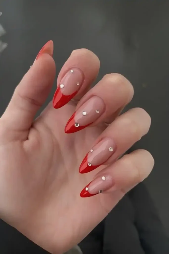 Red French Tips With Rhinestone Accents That Sparkle Elegantly