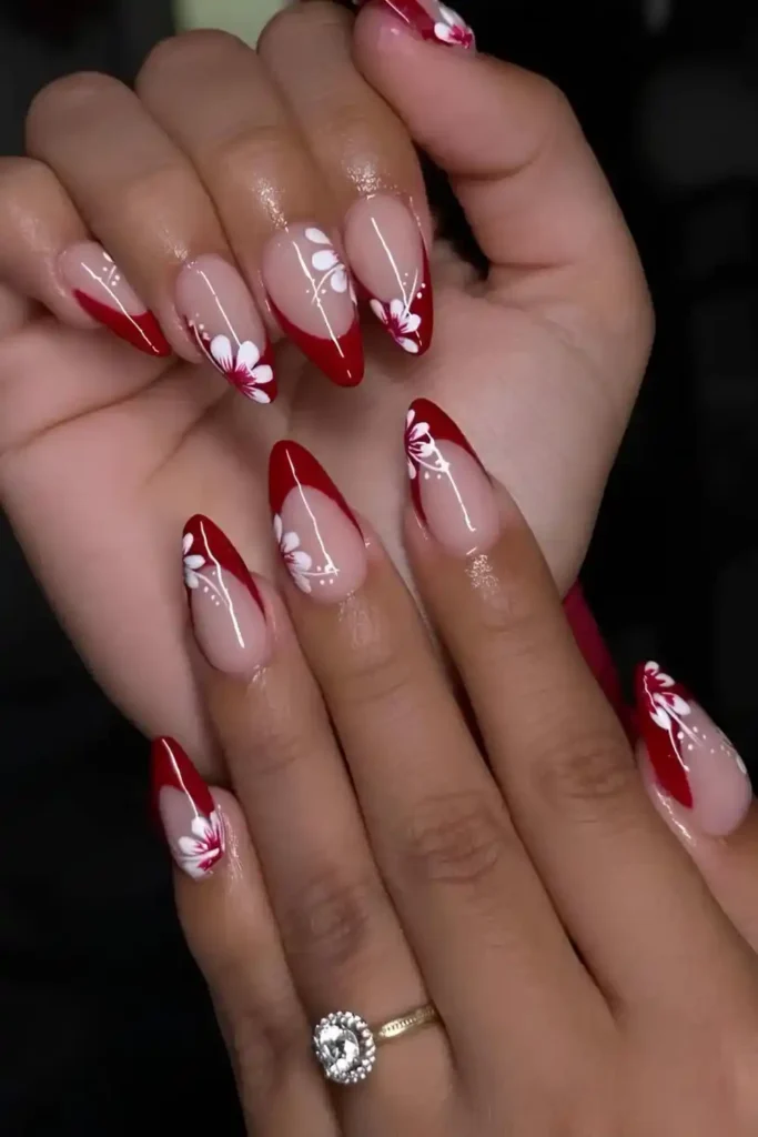 Red French Tips With White Flowers That Feel Fresh and Feminine