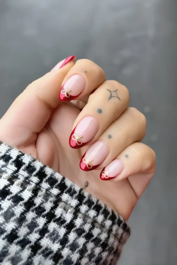 Red Chrome French Nails With Bows That Sparkle Beautifully