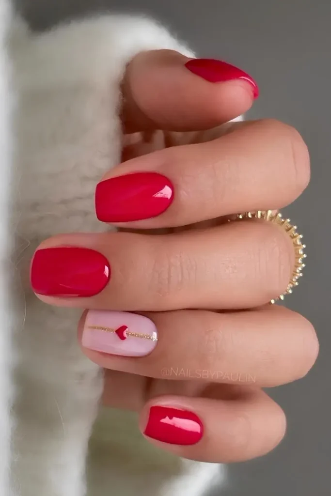 Red Nails With Hearts and Gold Glitter for a Romantic Look
