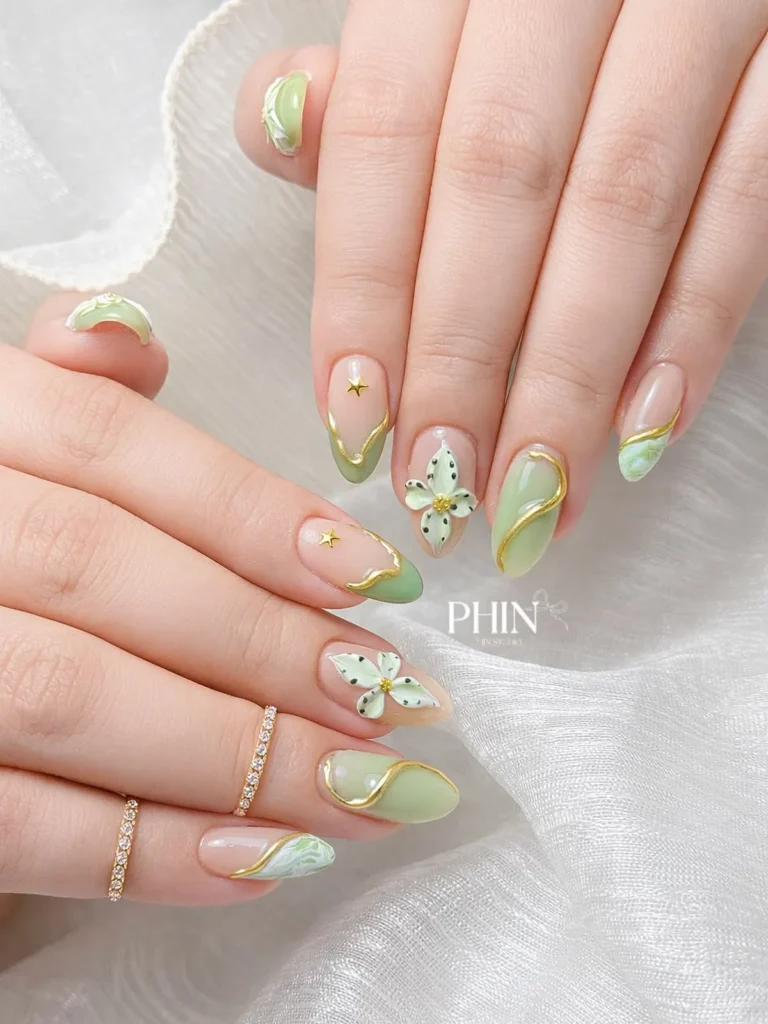 Sage Green Nails With Gold Swirls and Floral Accent for a Luxe Elegant Look