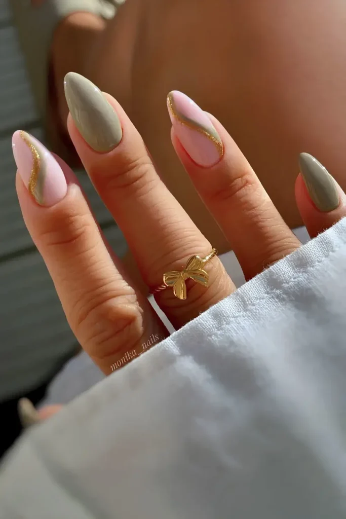 Sage Green Nails With Gold Glitter Swirls That Sparkle Beautifully