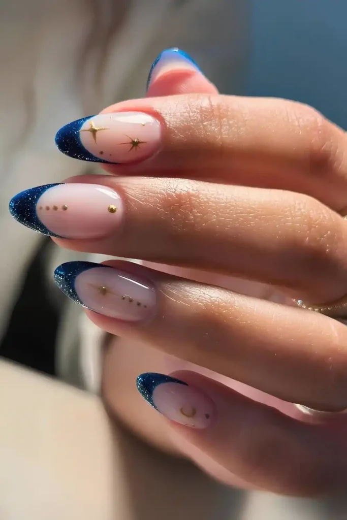 Shimmery Dark Blue French Mani With Gold Stars That Glows Beautifully