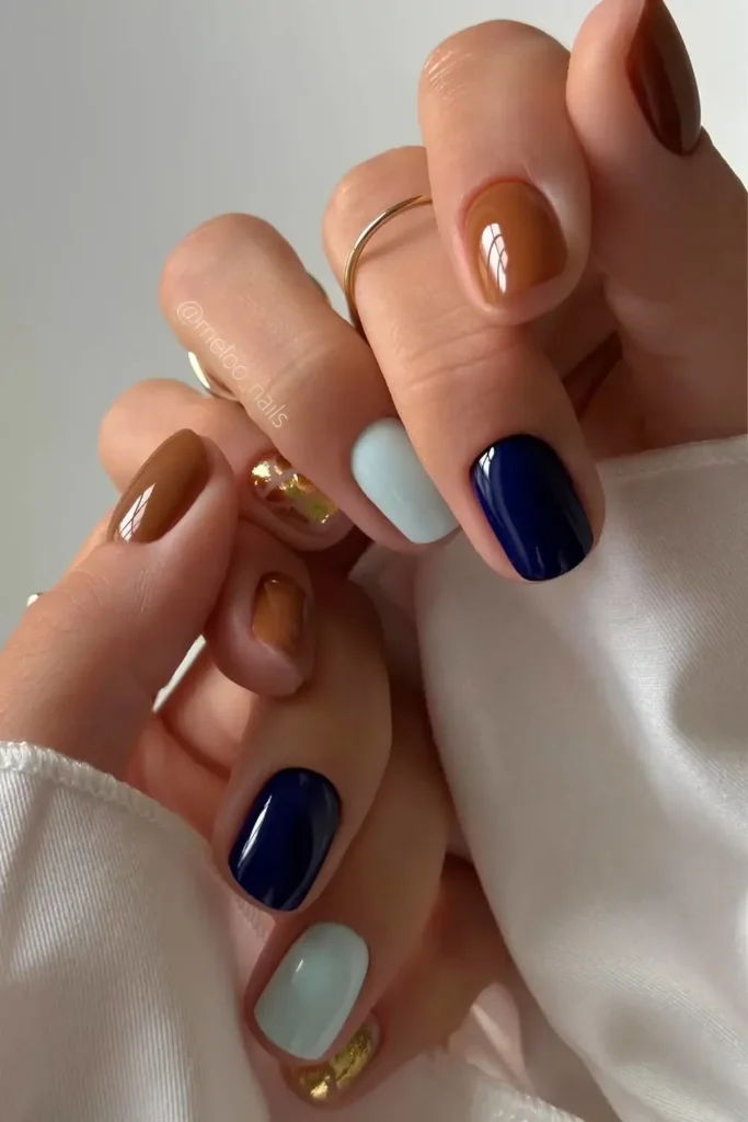 Navy Blue and Pink Mani With Glitter Accent