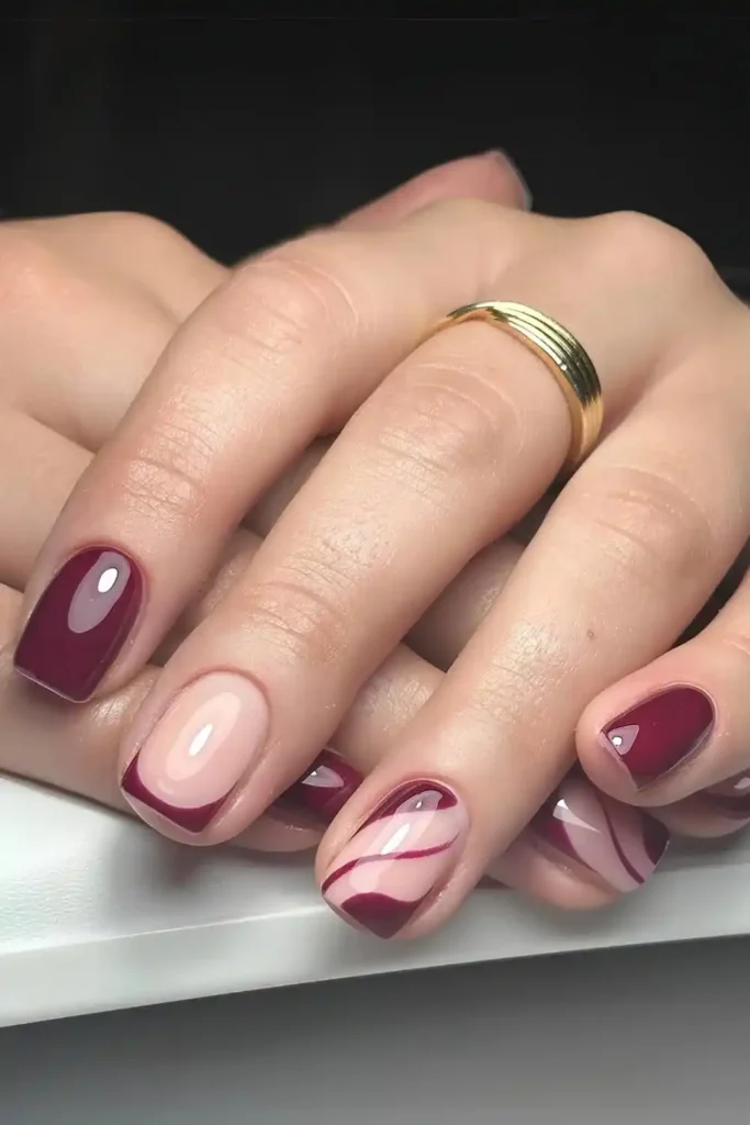 Short Burgundy Mani With Negative Space Design for a Trendy Look