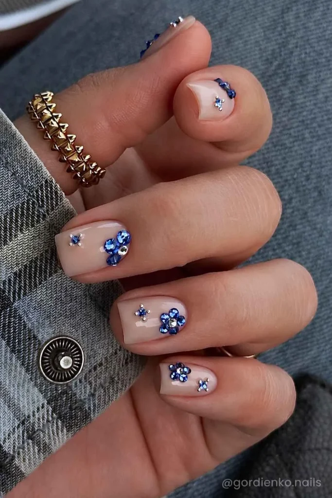 Short Milky Mani With Blue Gem Florals That Sparkle Beautifully