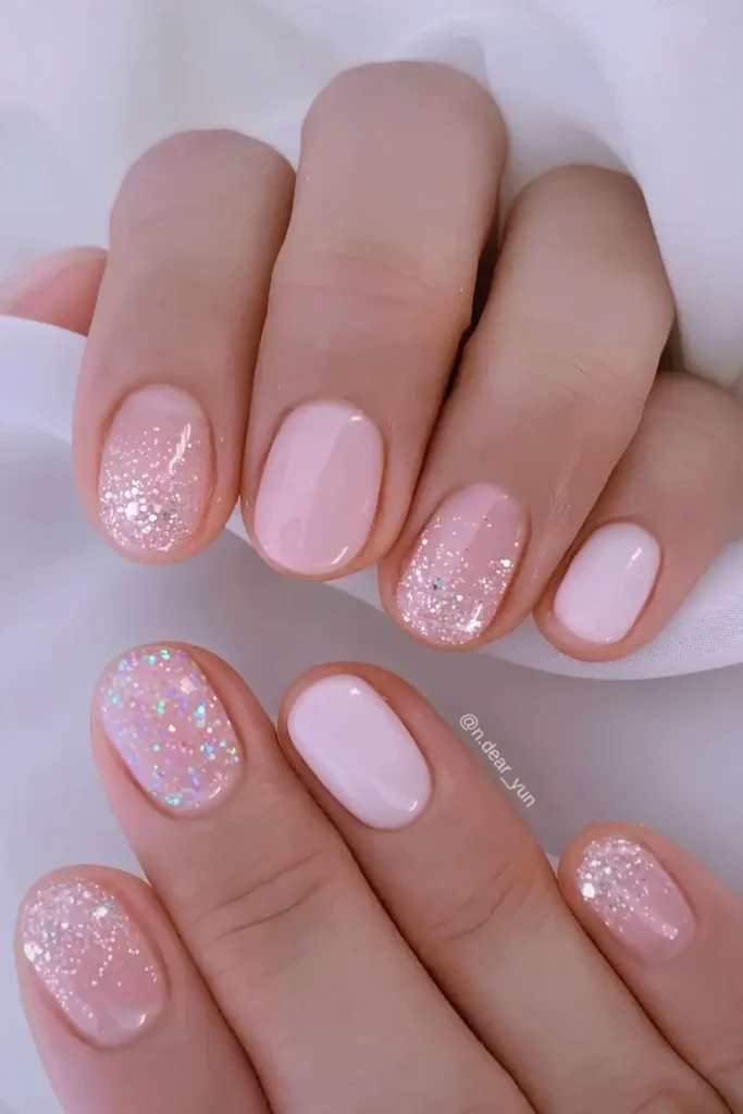 Short Pink Manicure With Glitter for a Chic Style