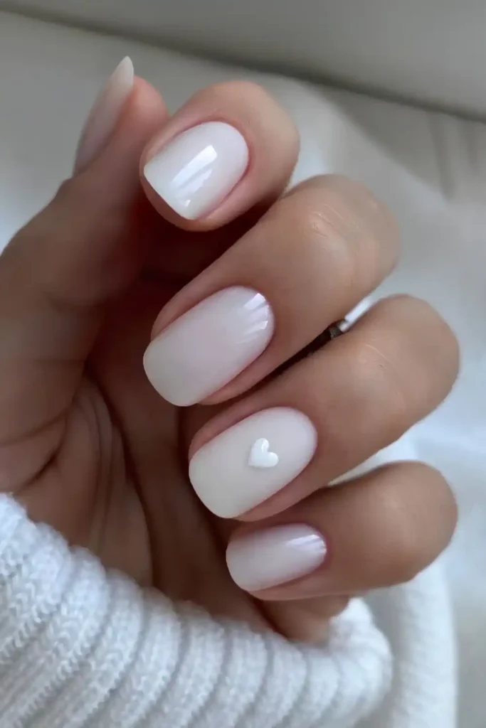 Short White Mani With Minimalist Heart Art for a Sweet Touch
