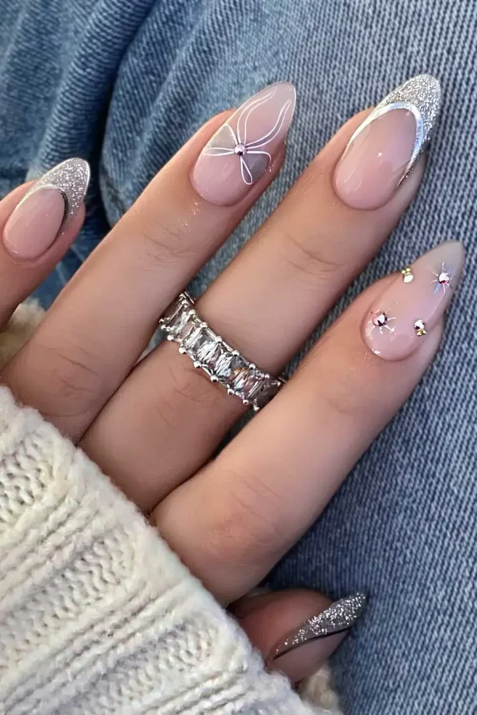 Silver Glitter French With Gems and Bows for a Glam Look